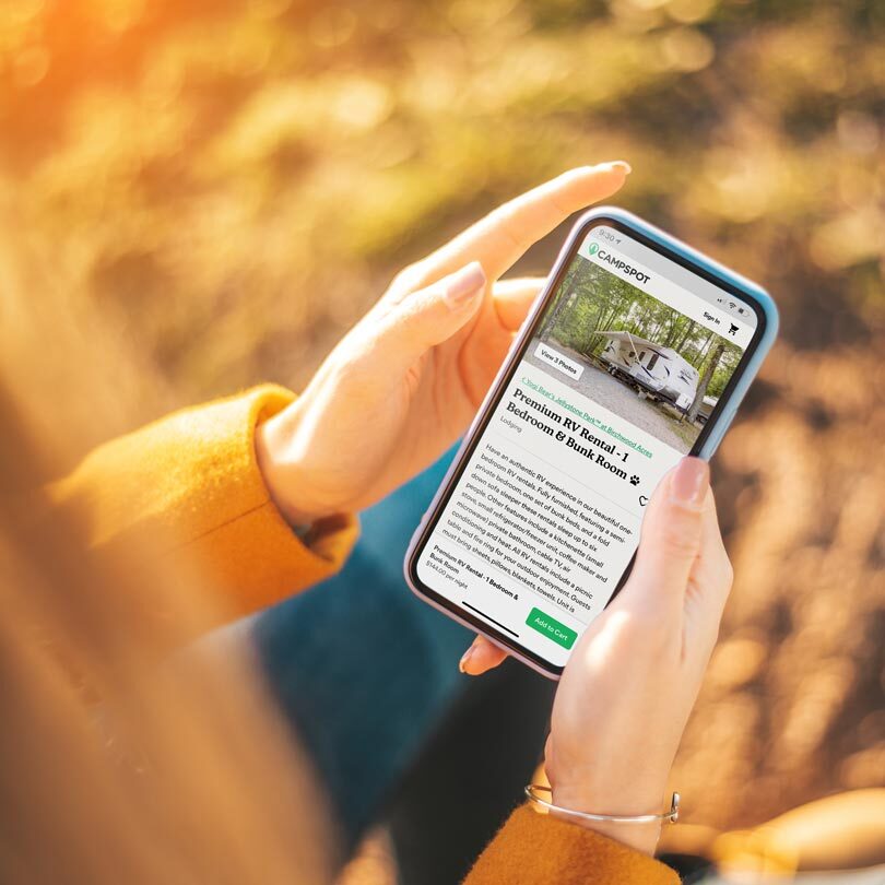 Person using Campspot on phone.