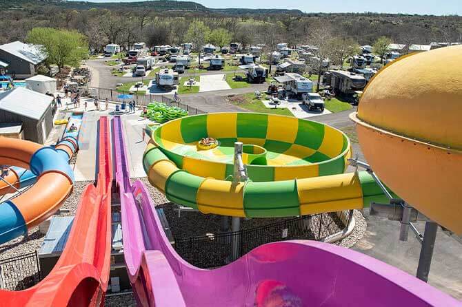 Bright, colorful water slides at a campground for families